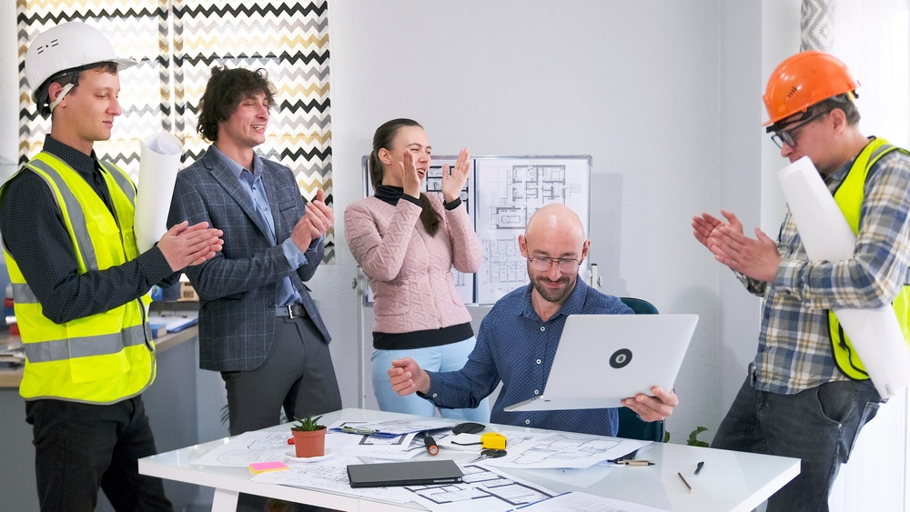 Global facilities management team ensuring regulatory compliance across diverse sectors and regions